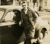 Man with his car in 1942