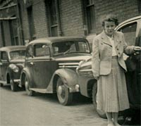 Lady prepares to board her Vauxhall car