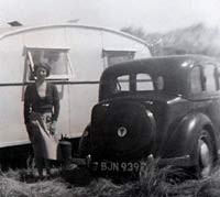 Rover P2 with an old caravan alongside