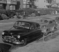 A Phase 1A parked with a Ford Pop, and Morris Oxford