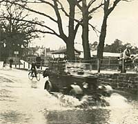 A Morris drives through Kenilworth's Ford on Castle Road