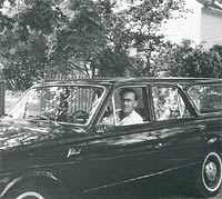 Driver in his Plymouth Valiant