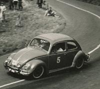 A Beetle competes in a race, circa 1959