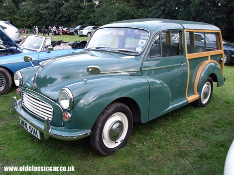 A very trim example of Morris Minor Traveller parked alongside an MGB.