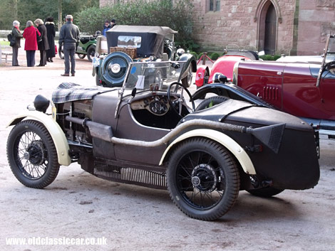 An M-Type MG Midget joins a variety of pre-war beauties at Peckforton Castle.