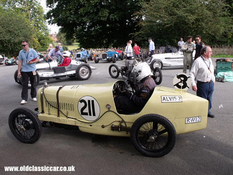 Cars congregate near to the start line at a VSCC Loton Park hillclimb meeting.