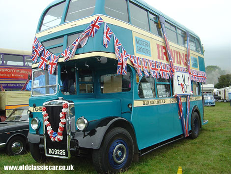 A preserved Leyland double-decker flies the flag.