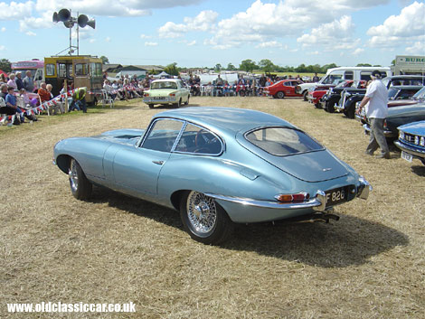 A Jaguar E-Type takes its turn in this show's display area.
