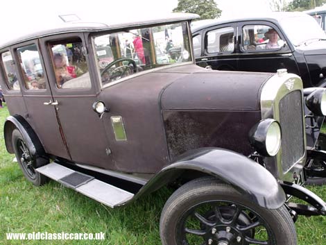 A well-preserved, fabric-bodied, Austin saloon.