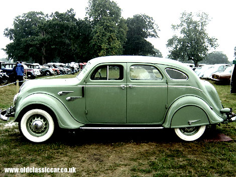 A stunning Chrysler Airflow gets a soaking at Astle Park.