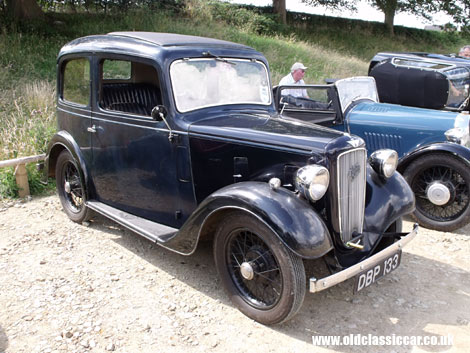 A mid-1930s Austin 7 Ruby takes part in a vehicle rally.