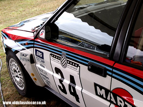A modern classic, the Martini-liveried Lancia Delta Integrale rally car.