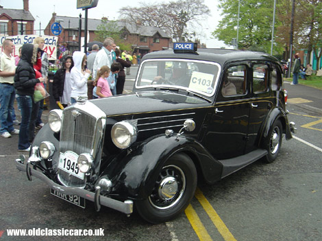 A Wolseley Police car patrols the roads of Sandbach.