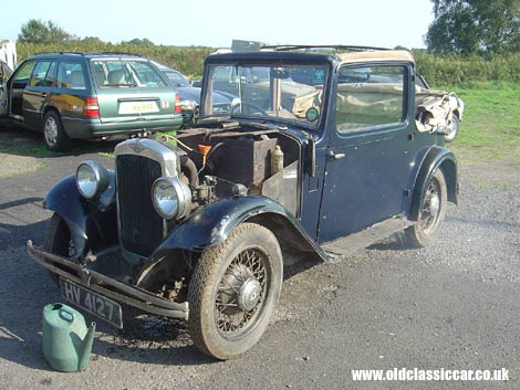 A car I once owned, a 1934 Austin 10/4 cabriolet being test run at a friend's garage.