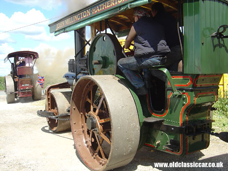 Two steam road rollers rumble by at Smallwood show.