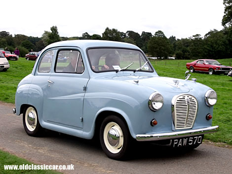 A Shropshire-registered Austin A35 in two-door form arrives at a classics show.