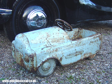 Cars large and, in the case of this 1950s pedal car, small, all feature on this website.