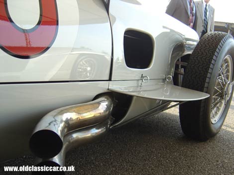 A 1950's Mercedes-Benz at rest in the Goodwood paddock.