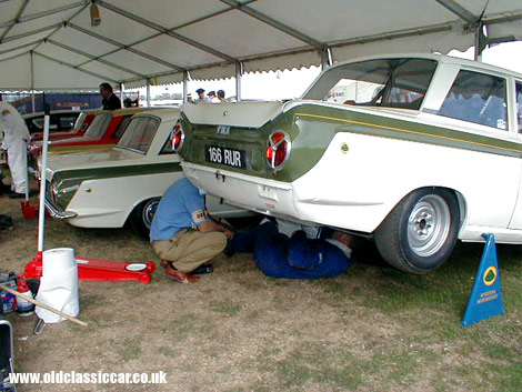Various Lotus Cortinas receive some fettling at a Revival a few years back.